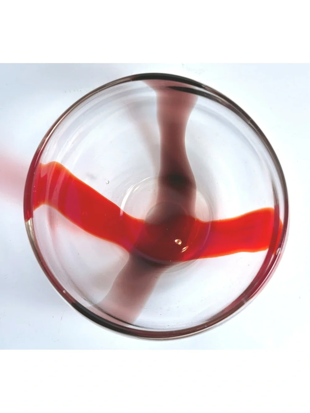 Hand-Blown Glass Bowl with Red Swirl Design